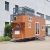 Import Deepblue Smarthouse Prefabricated  tiny house on wheels with trailer  made from light Steel Frame from China