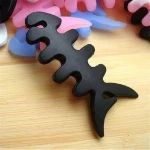 Dog bone silicon cable winders silicone headphone earphone cord winder manufacturer