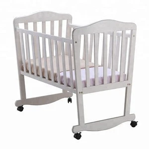 High quality Solid wood toddler bed Hand Actuated Newborn baby Cradle swing Crib