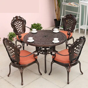 Hot sale modern design stainless material Outdoor villa Garden furniture dining table and chairs combination for restaurants