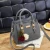 Import 2023 New Womens Tote and Crossbody Bag with Double-Layer Large Capacity and Pom Pom Design from China