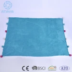 Best selling hot chinese products solid coral fleece blanket with ponpon