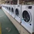Import Coin feed fully automatic commercial front loading tokens operate washing machine 8kg from China