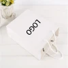 Custom logo design shopping bag promotional gift bag white cardboard with handle folding paper shopping bag