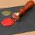Import Custom Pattern Embossing Brass Sealing Wax Wooden Handle Stamp For Studio Supplies from China