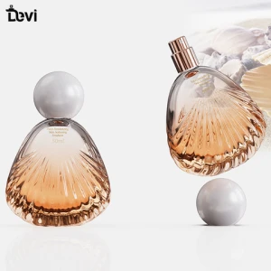 Devi Wholesale100ml luxury class cap empty  round fancy perfume glass bottle for sale elegant perfume bottles