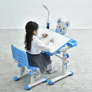 Height adjustable children multifunction study table for kids