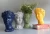 Import high quality Home Decoration Collection resin head flower vase from China