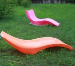 In-Pool Ledge Lounger plastic sun lounger relaxing on water