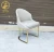 Import modern design  velvet fabric upholstered gold stainless steel frame luxury dining chair from China
