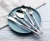 Import New Arrival China Wholesale 18/10 Stainless Steel Flatware Black And White Marbling Plastic Handle Wedding Hotel Cutlery Set from China