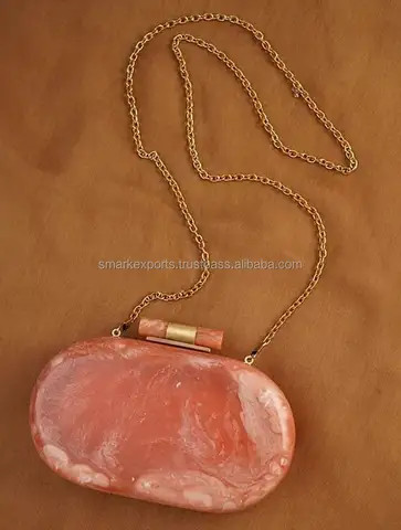 "Peach Perfection: Exquisite Handcrafted Resin Clutch - Elevate Your Fashion with the Best Quality"