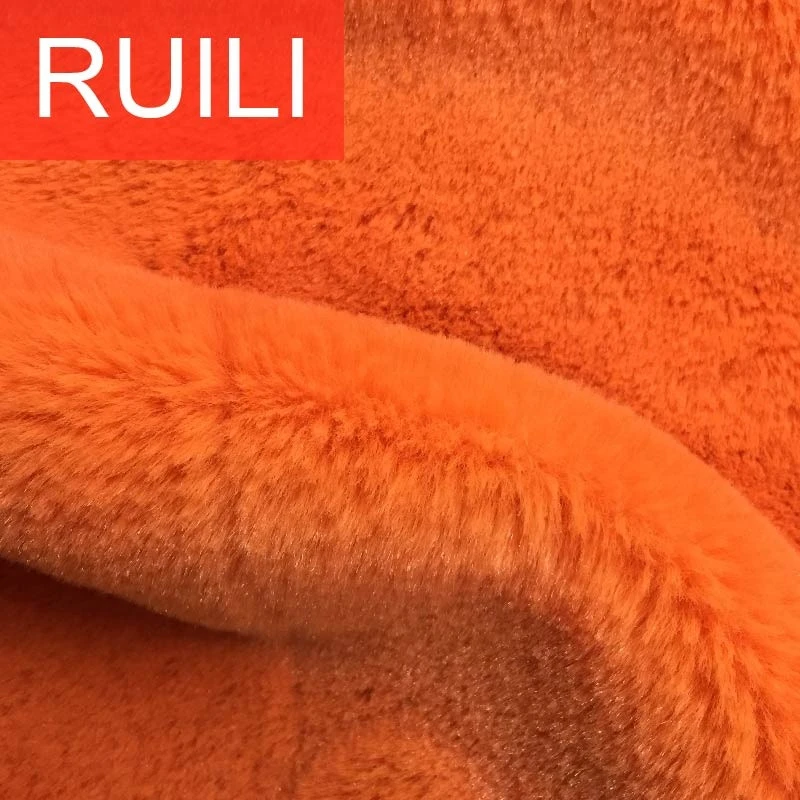 Solid color orange fake faux rabbit fur plush fabric