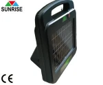 Waterproof solar and battery powered fence energizer