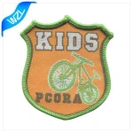 Wholesale merrow border custom brand name logo machine woven badges for school uniform