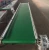 Import Industrial Assembly Line Green PVC Belt Conveyor Material Handling Equipment from China
