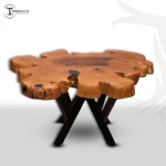 The table is artistically designed in the shape of a flower made from natural wood