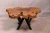 Import The table is artistically designed in the shape of a flower made from natural wood from Egypt