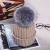 Import 100% Wool knitted hat fur ball beanie custom winter hats with big pom poms from China