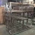 Import Heavy Duty Stainless Steel 4 Tiers Vegetable Shelf  Decorative Metal Supermarket Shelf Rack from China