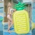 Import Hot sales thicken pvc Inflatable Big pineapple On the water Floating row Swimming ring from China