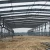 Import Industrial factory warehouse store low cost portable quick build large-span prefabricated steel structure warehouse from China