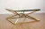 Import Modern glass top polished stainless steel base coffee table gold from China