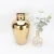Import Modern wholesale ceramic gold flower vase porcelain gold hammered tabletop vase from China