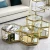 Import New style stainless steel golden coffee table  for living room glass center table set new design furniture for sale from China