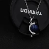 silver globe pendant necklace with blue crystal quartz