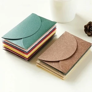 Small envelope greeting card packaging can be held in the palm of the kraft paper produced