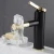 Import Brass rotatable black gold cold hot wash basin tap bathroom water tap from China