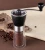 Import Ceramic Core Coffee Grinder Coffee Beans Hand Mill Small Mini ABS Portable Coffee Grinder from China