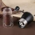 Import Ceramic Core Coffee Grinder Coffee Beans Hand Mill Small Mini ABS Portable Coffee Grinder from China