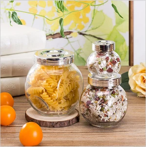 cheap small Flat drum 300ML fancy candy chocolate nut food storage canister glass jar with silver plastic lid 10oz