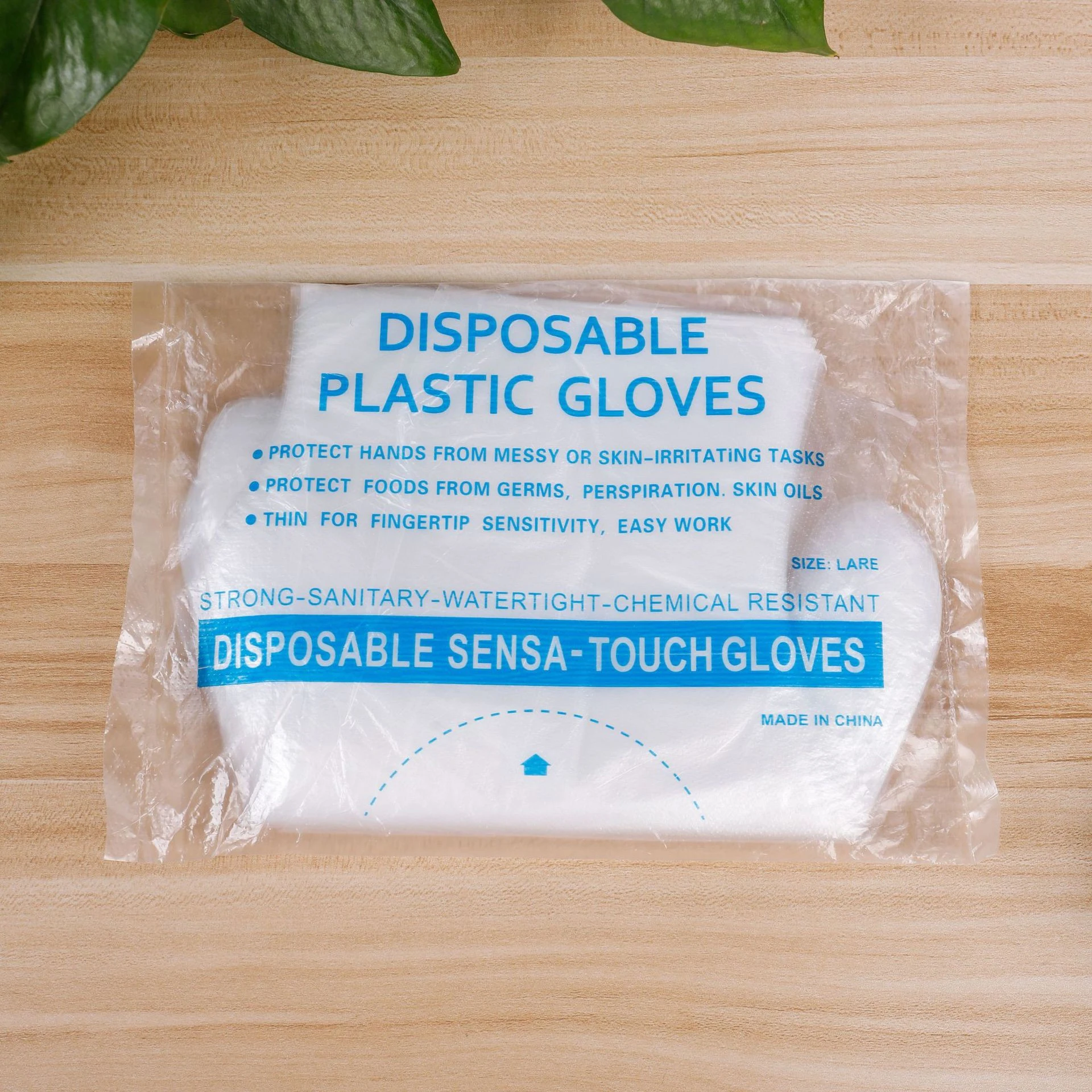 Wholesale disposable plastic gloves food plastic transparent gloves household kitchen beauty salon disposable PE gloves