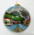 hand painted glass bauble inside hand painted Christmas baubles