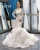 Import 2020 new style mermaid tail elegant off shoulder luxurious long sleeve ruffle lace trumpet wedding dress from China