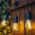 Import 48 Feet outdoor Waterproof Holiday led Light string Hanging Sockets Perfect S14 Patio string Lights from China