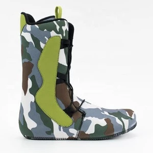 Adult green fashionable ski boots for winter skiing