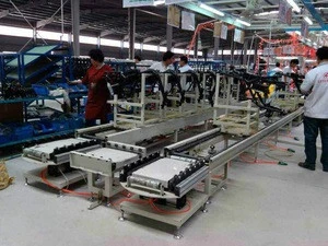 Automatic industrial motorcycle assembly line drag chain plate conveyor factory supplier