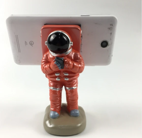 Customized Polyresin astronaut shape mobile phone holder Unique shape phone holder made in china
