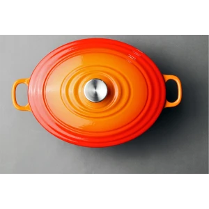 Enamel oval cast iron casserole for cooking