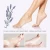 Import Foot Peeling Mask Feet Exfoliating Callus Scrub Remove Dead Skin Silky Foot Mask foot mask from China