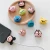 Import hot selling Cartoon bite mobile phone earphone USB charging cable protector wholesale from China