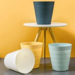 Modern round plastic trash bin waste paper is used to store and contain waste in the bathroom kitchen home office craft room