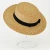 Import natural custom school gift straw boater hat cheap wheat wide brim straw hat with bow from China