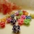 Import 30mm flower artistical painting glass christmas ornament partscustom logo beads from China