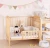 Import Baby cot bed prices cost-effective,movable modern wooden cot design from China