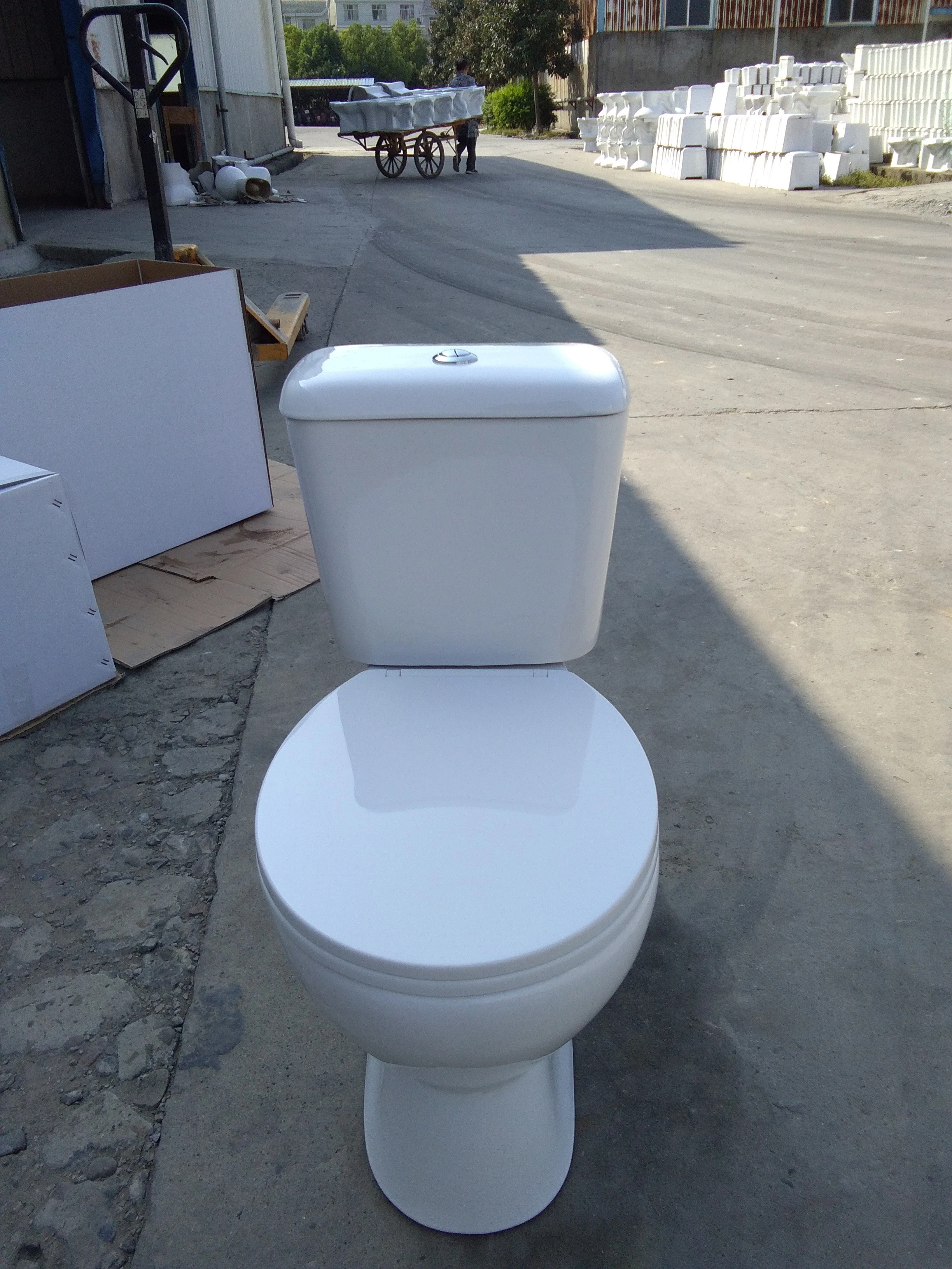Chinese saving water cheap p-trap ceramic wash down two piece toilet set